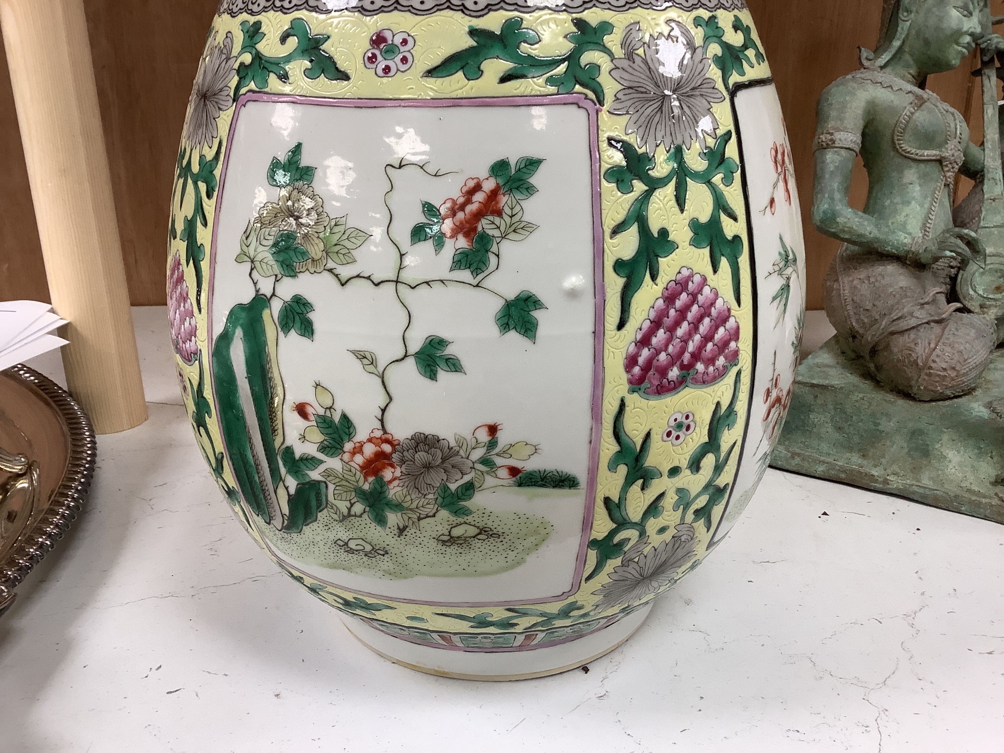 A large 19th century Chinese famille verte yellow ground bottle vase, height 47cm, restorations